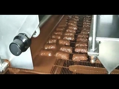 enrobeuse pure de chocolat de largeur de 1200mm avec deux pompes et tunnels de refroidissement